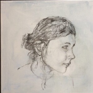 A charcoal drawing of our granddaughter Julie from a photo taken when she was 15. Young Julie